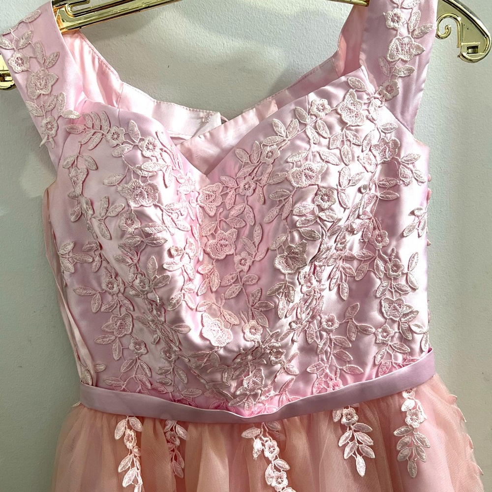 A mini floral blush pink, off the shoulders, dinner dress.